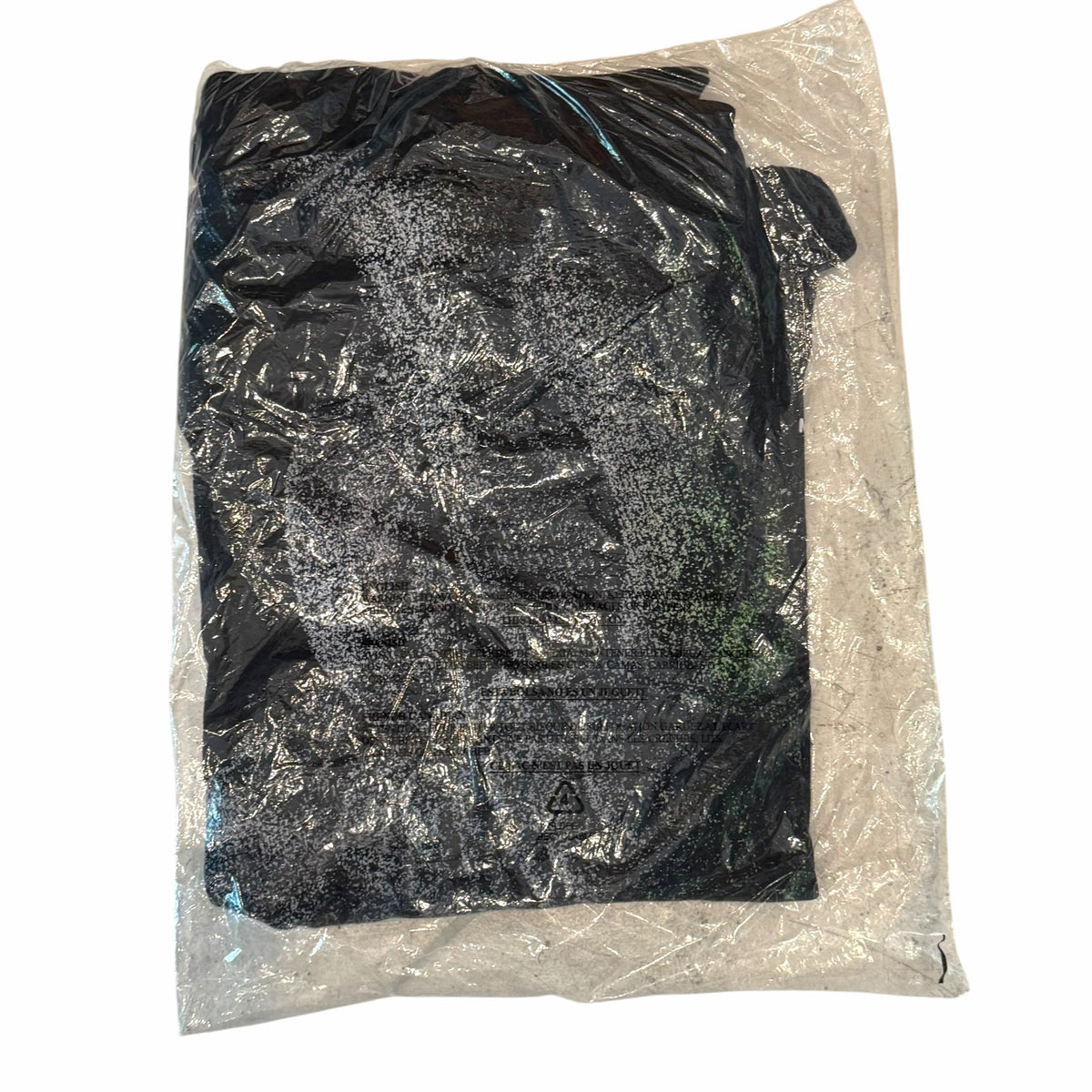 Vangsworld, Inc black Bane Side-By-Side Series graphic t-shirt packaged in a clear protective plastic bag