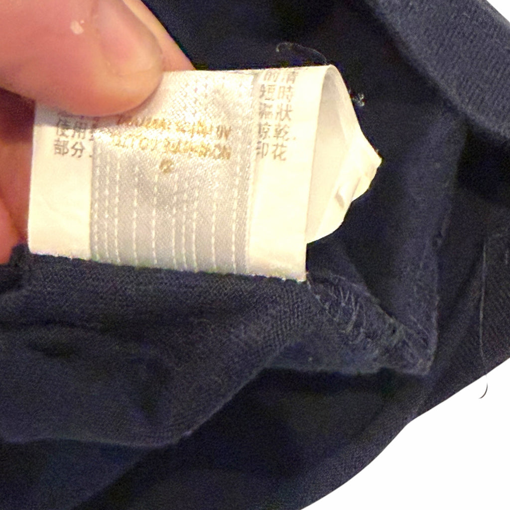 Vangsworld, Inc A BATHING APE X COACH collaborative t-shirt interior care and origin label on navy cotton fabric