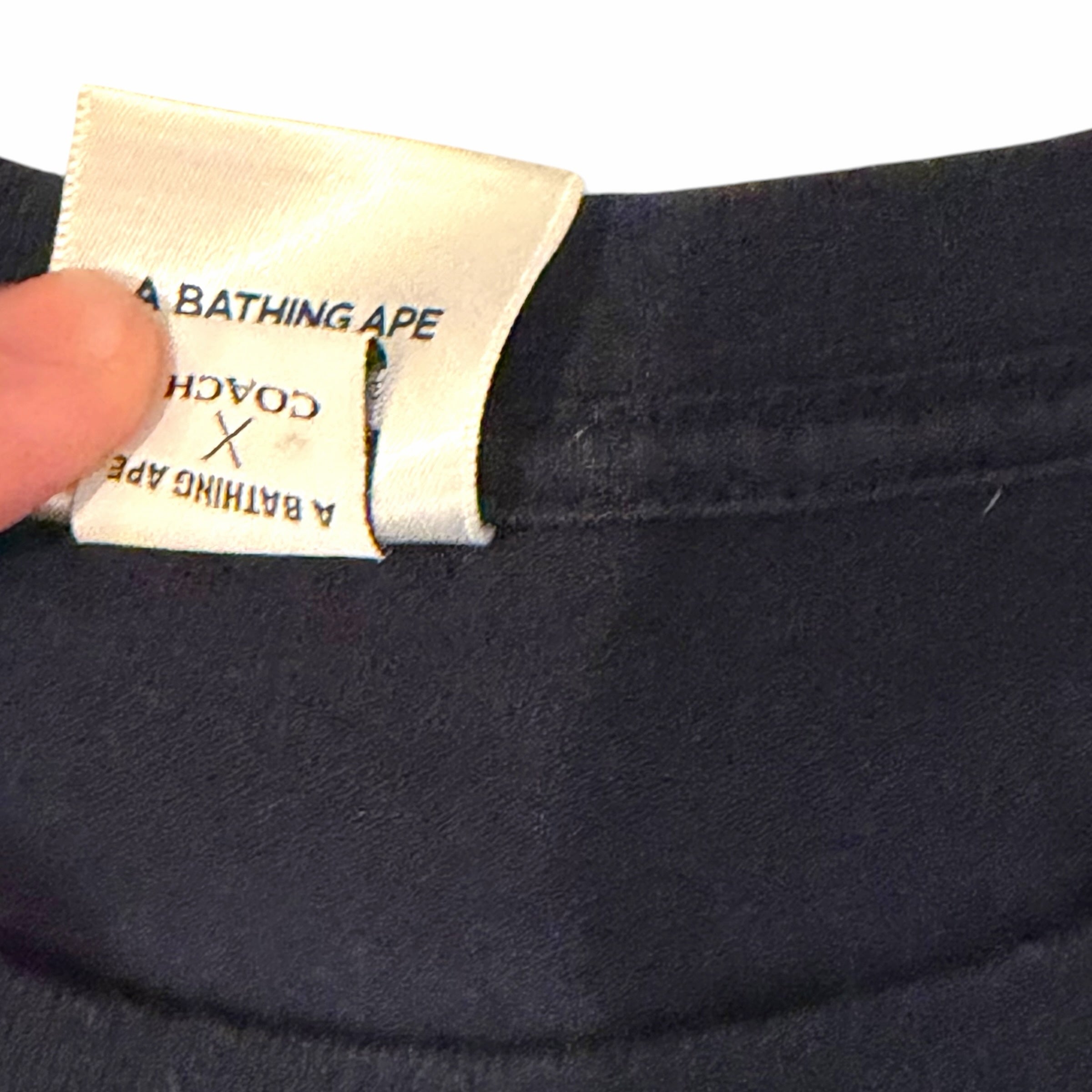 Vangsworld, Inc A BATHING APE X COACH navy cotton t-shirt interior co-branded neck label detail