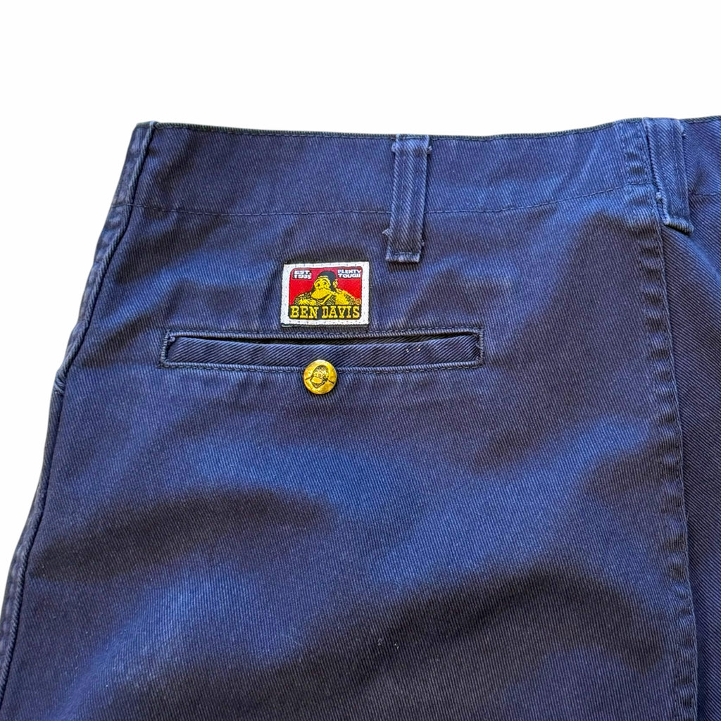Vangsworld, Inc navy blue BEN DAVIS work pants featuring a rear pocket with signature logo patch and gold button