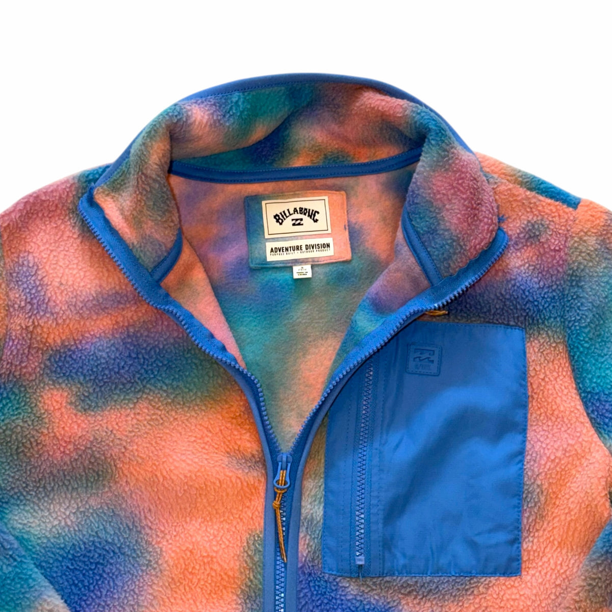 Vangsworld, Inc Billabong Adventure Division multi-colored tie-dye fleece jacket with blue chest pocket and zip collar
