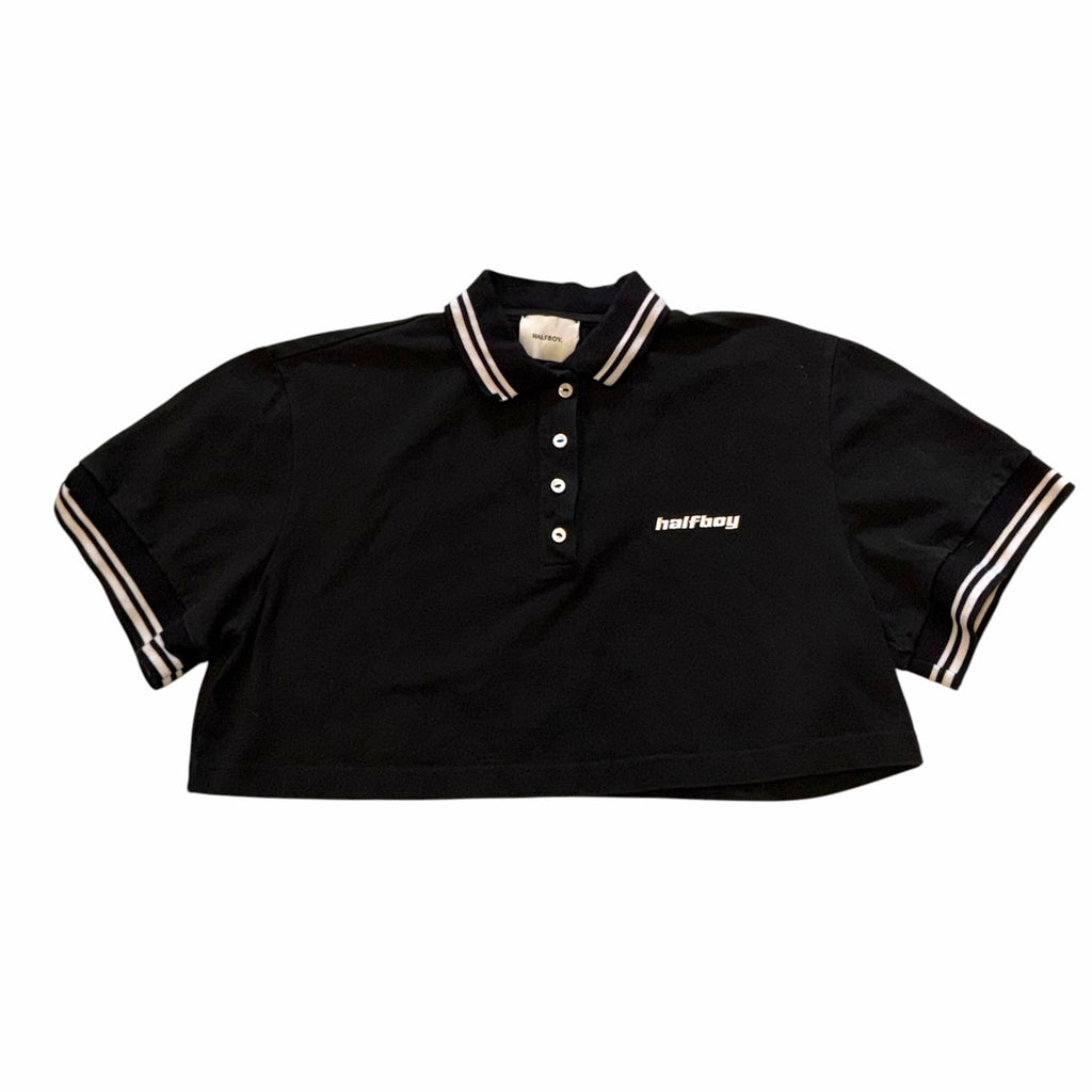 Vangsworld, Inc black cropped polo shirt with white striped collar and cuffs and embroidered logo