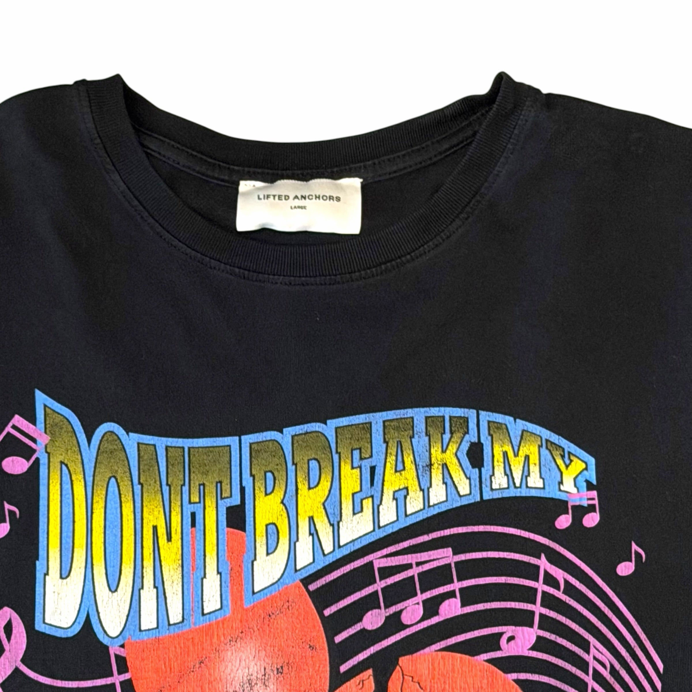 Vangsworld, Inc black cotton graphic t-shirt with vibrant country music themed print and crew neckline