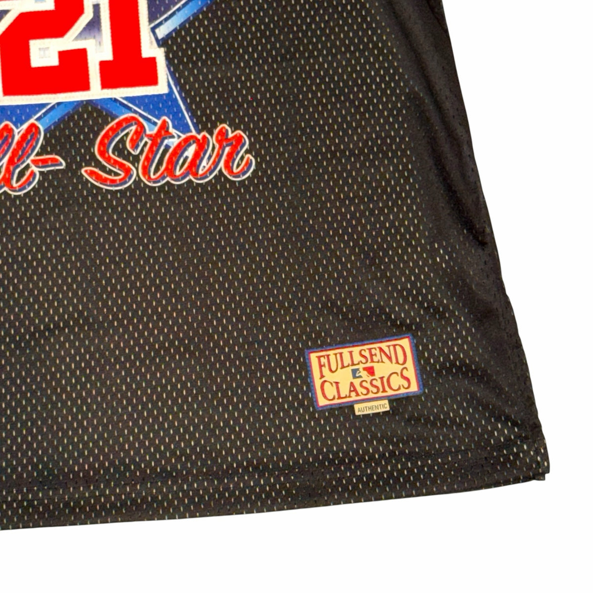 Vangsworld, Inc black mesh basketball jersey with red and blue All Star graphics and a woven hem patch
