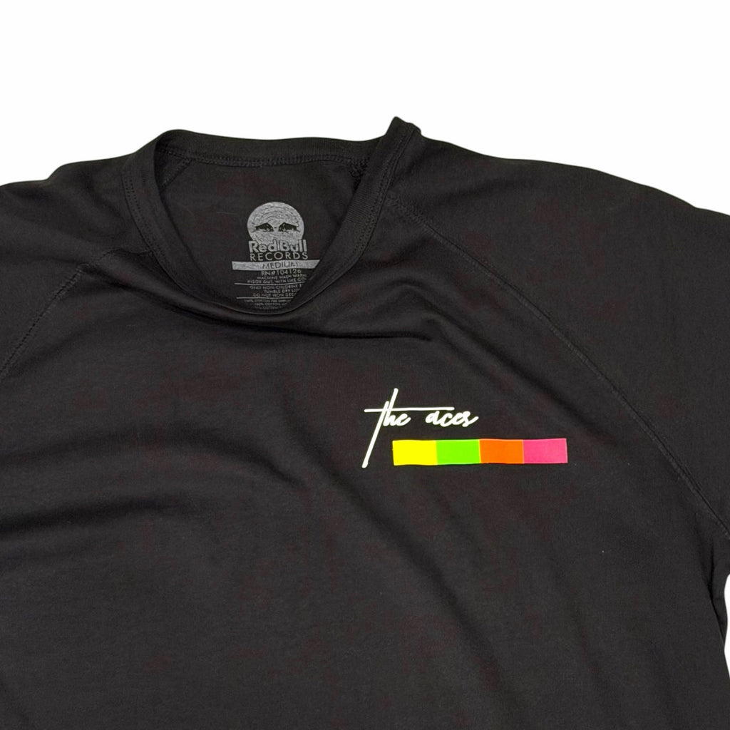 Vangsworld, Inc black raglan t-shirt featuring The Aces logo and vibrant multi-colored block graphic on the chest