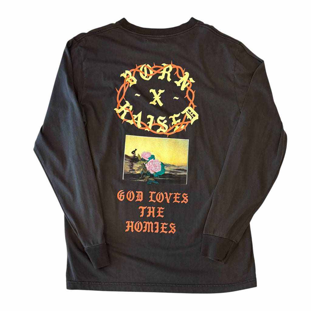 Vangsworld, Inc black long sleeve crewneck featuring a thorn-encircled logo, sunset graphic, and floral motif on back