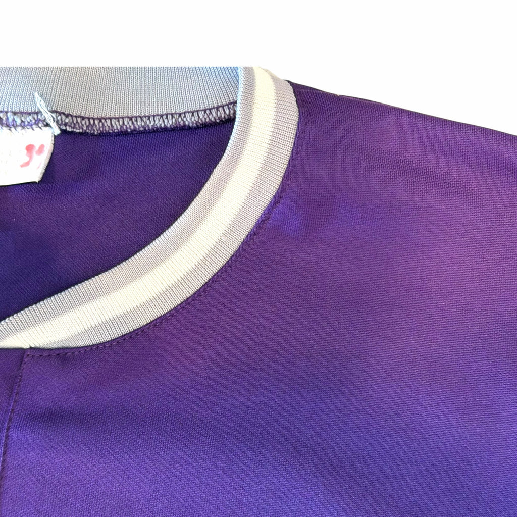 Vangsworld, Inc purple Colorado Rockies baseball jersey with grey and white striped collar trim