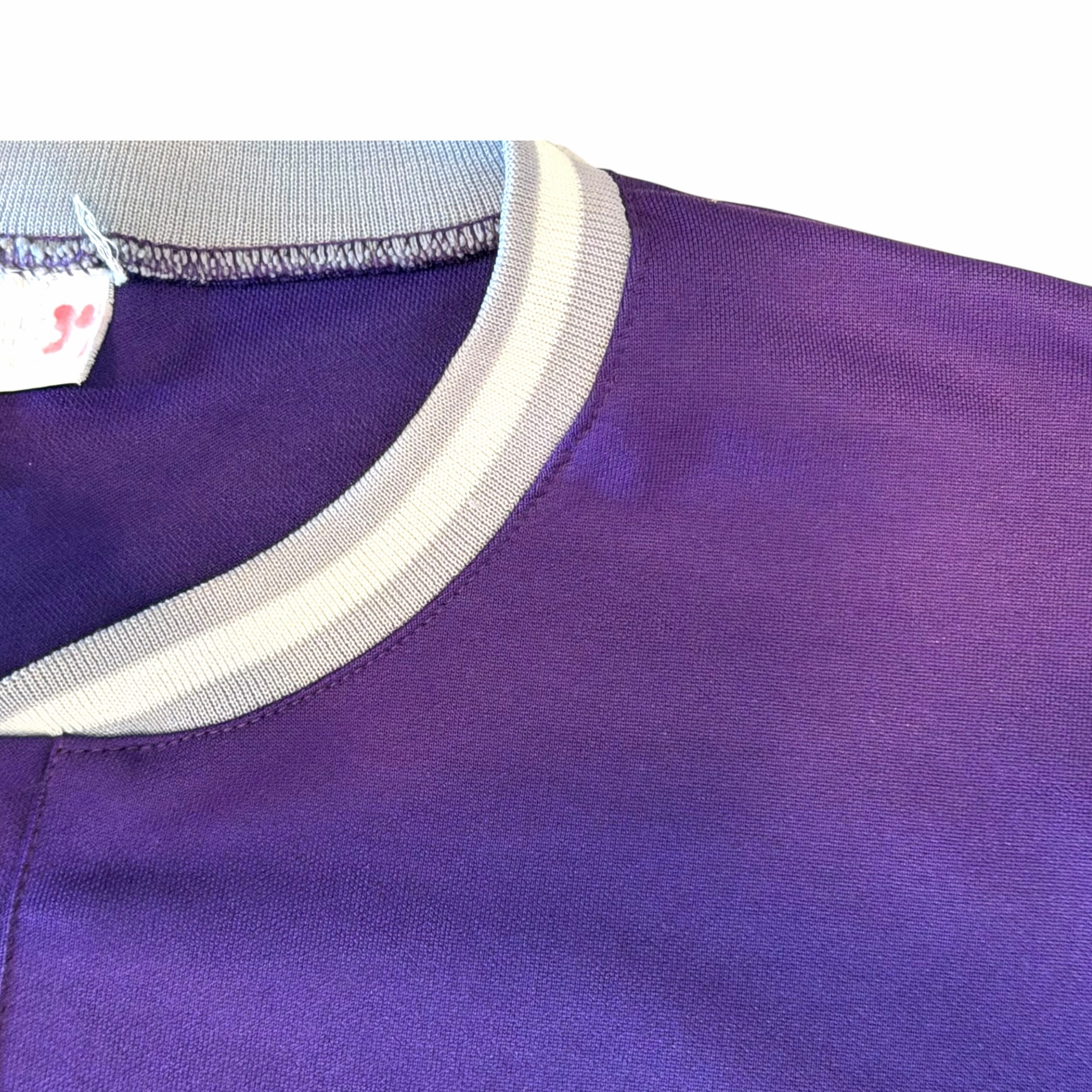 Vangsworld, Inc purple Colorado Rockies baseball jersey with grey and white striped collar trim