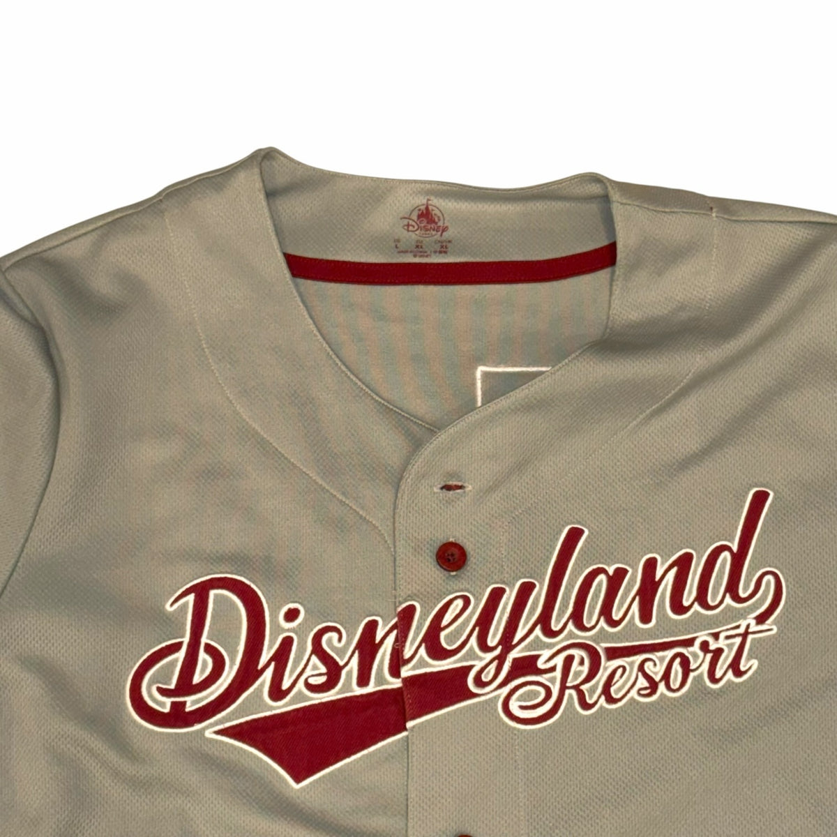 Vangsworld, Inc grey mesh Disneyland Resort baseball jersey with red script logo and matching red buttons.