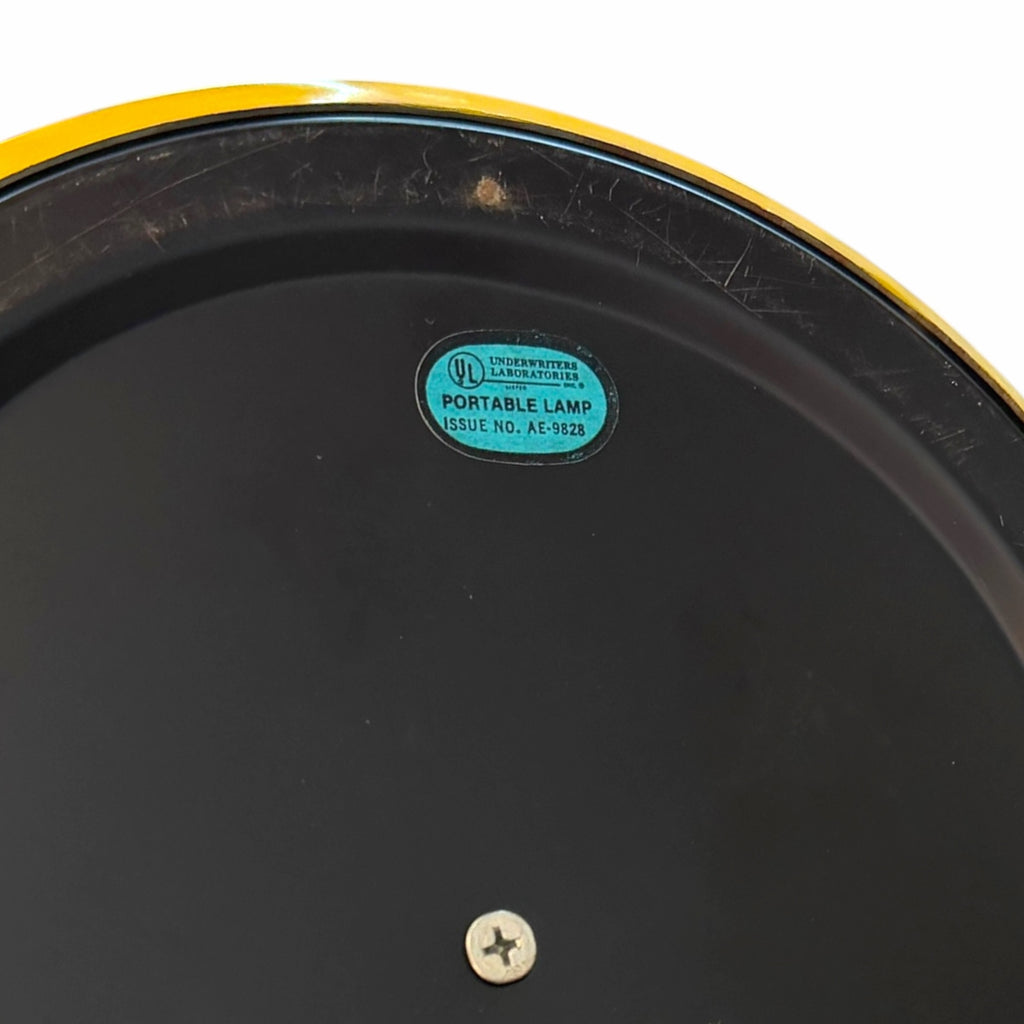 Vangsworld, Inc. duck lamp base underside with black finish, UL certification sticker, and central mounting screw.