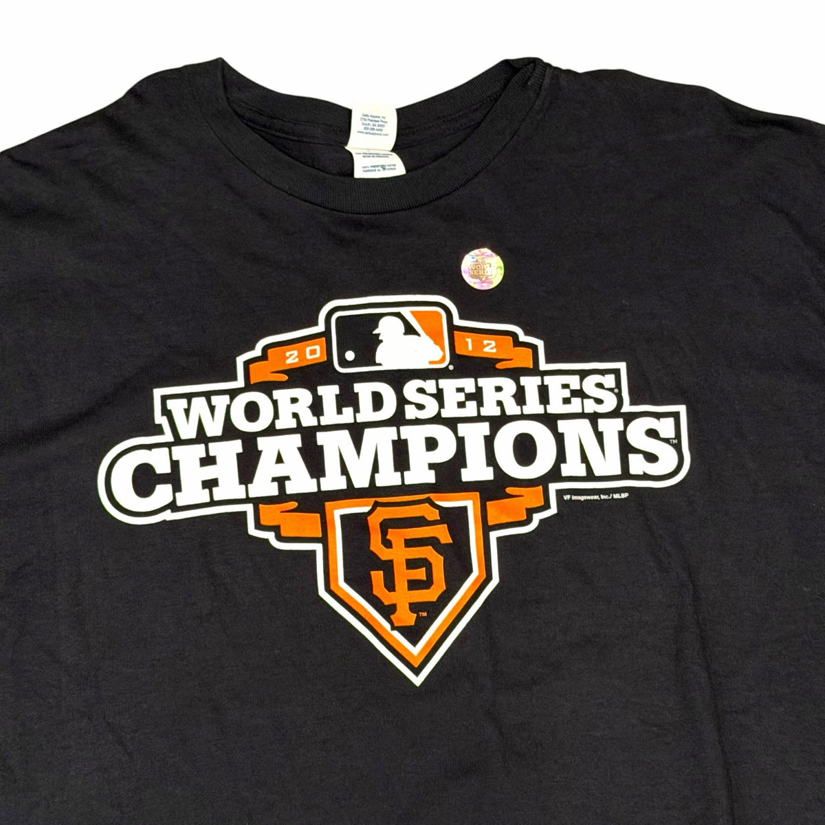 Vangsworld, Inc black cotton t-shirt featuring a 2012 San Francisco Giants World Series Champions graphic on the chest.