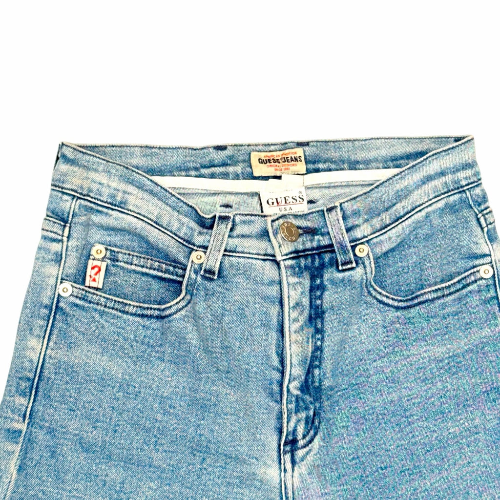 Vangsworld, Inc vintage GUESS JEANS high-rise denim pants in a medium-blue wash with signature coin pocket branding.
