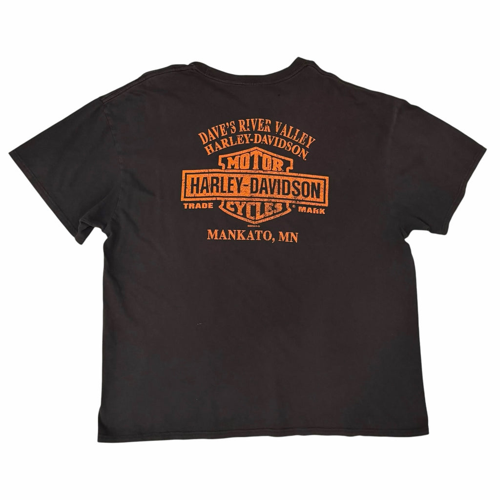 Vangsworld, Inc black Harley-Davidson short sleeve t-shirt with orange vintage dealership graphic on the back