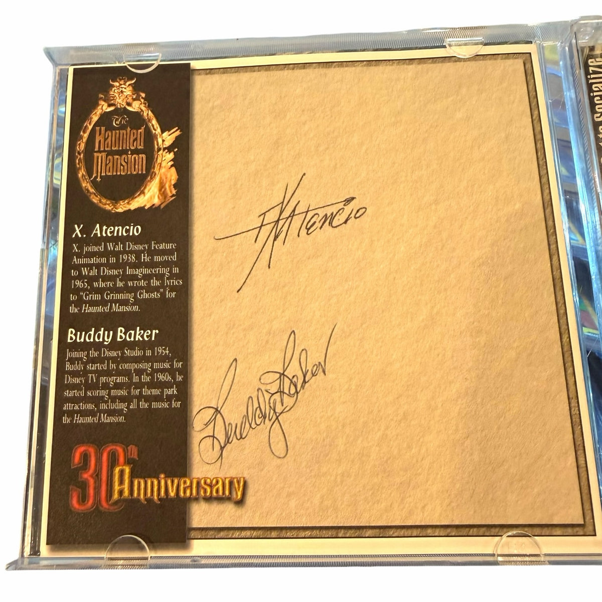 Vangsworld, Inc The Haunted Mansion 30th Anniversary CD featuring printed signatures of X. Atencio and Buddy Baker.