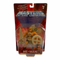 Vangsworld, Inc Masters of the Universe He-Man action figure in original packaging with Power Sword, shield, and axe.