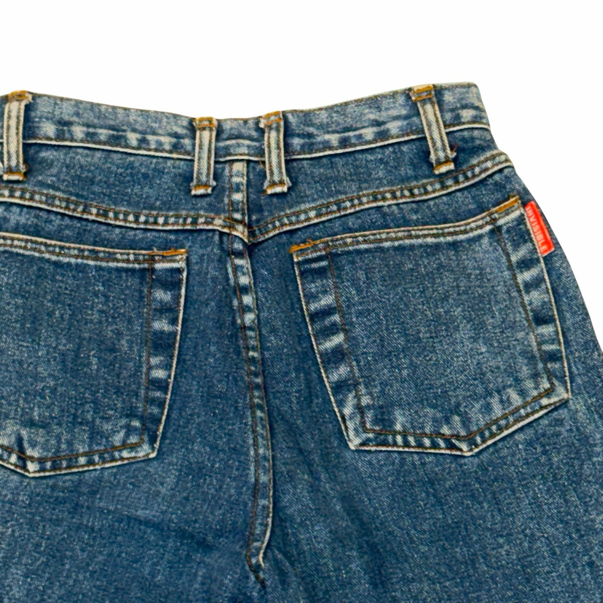 Vangsworld, Inc high-waisted medium-blue denim jeans with back pockets and a small red brand tag