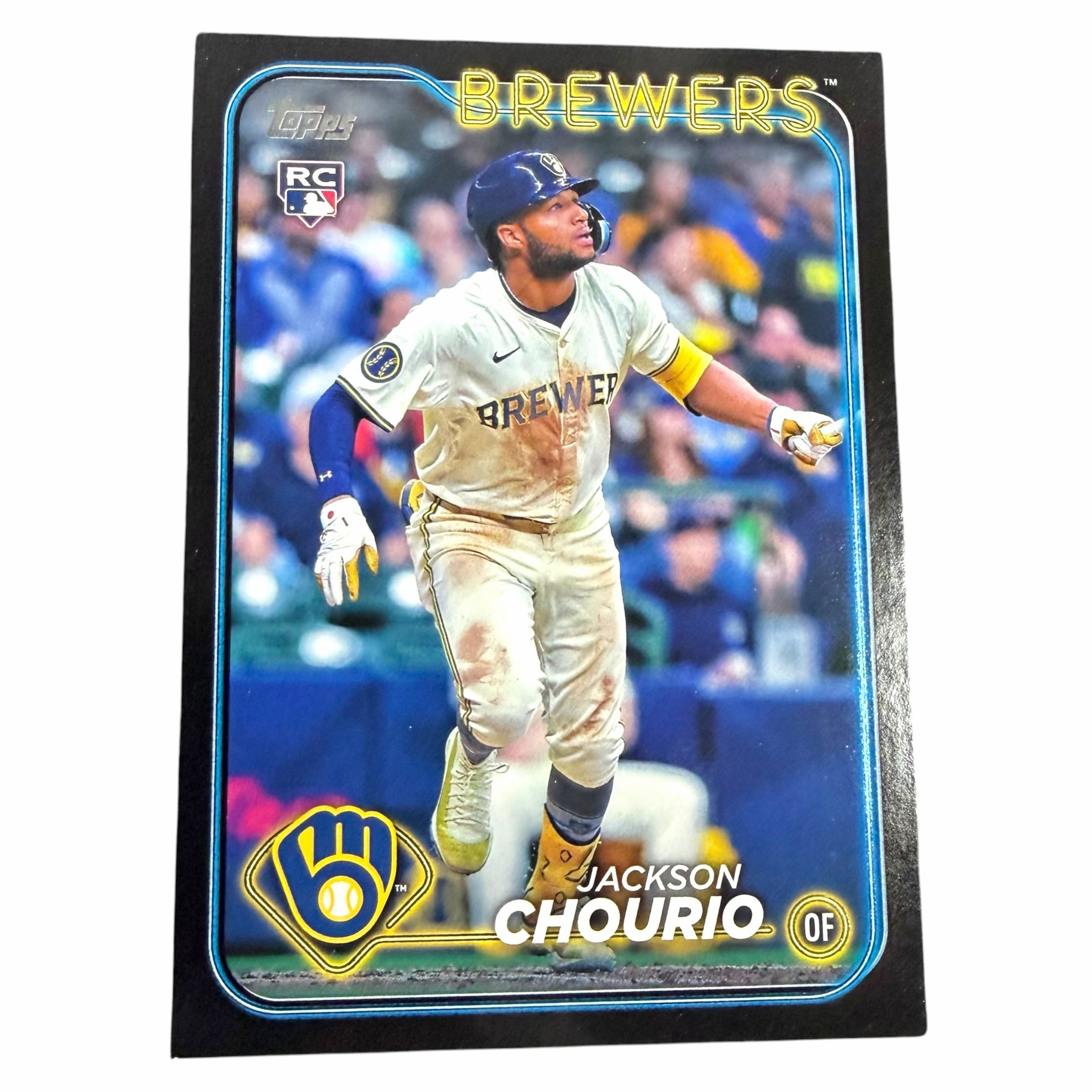Vangsworld, Inc 2024 Topps Jackson Chourio rookie baseball card featuring the Milwaukee Brewers outfielder in action