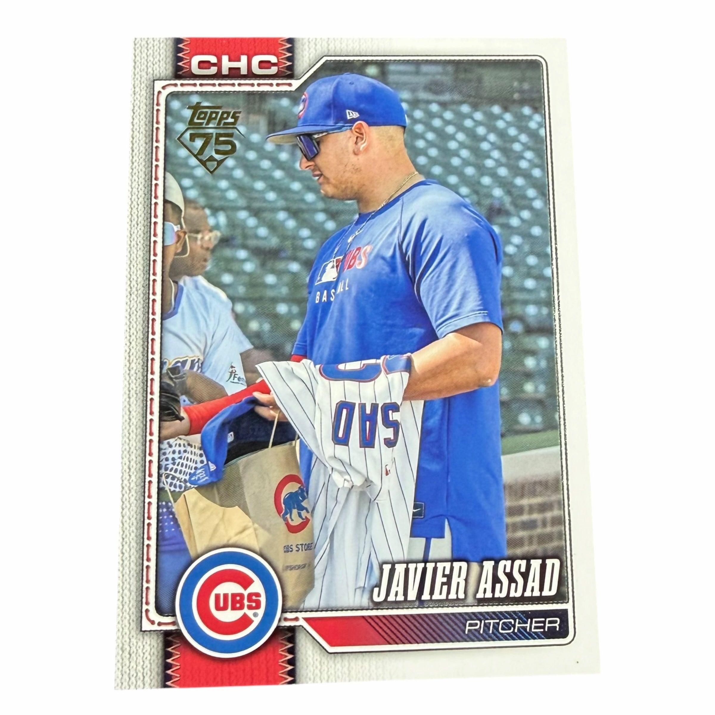 Vangsworld, Inc 2024 Topps Javier Assad Chicago Cubs baseball trading card featuring the pitcher in team gear
