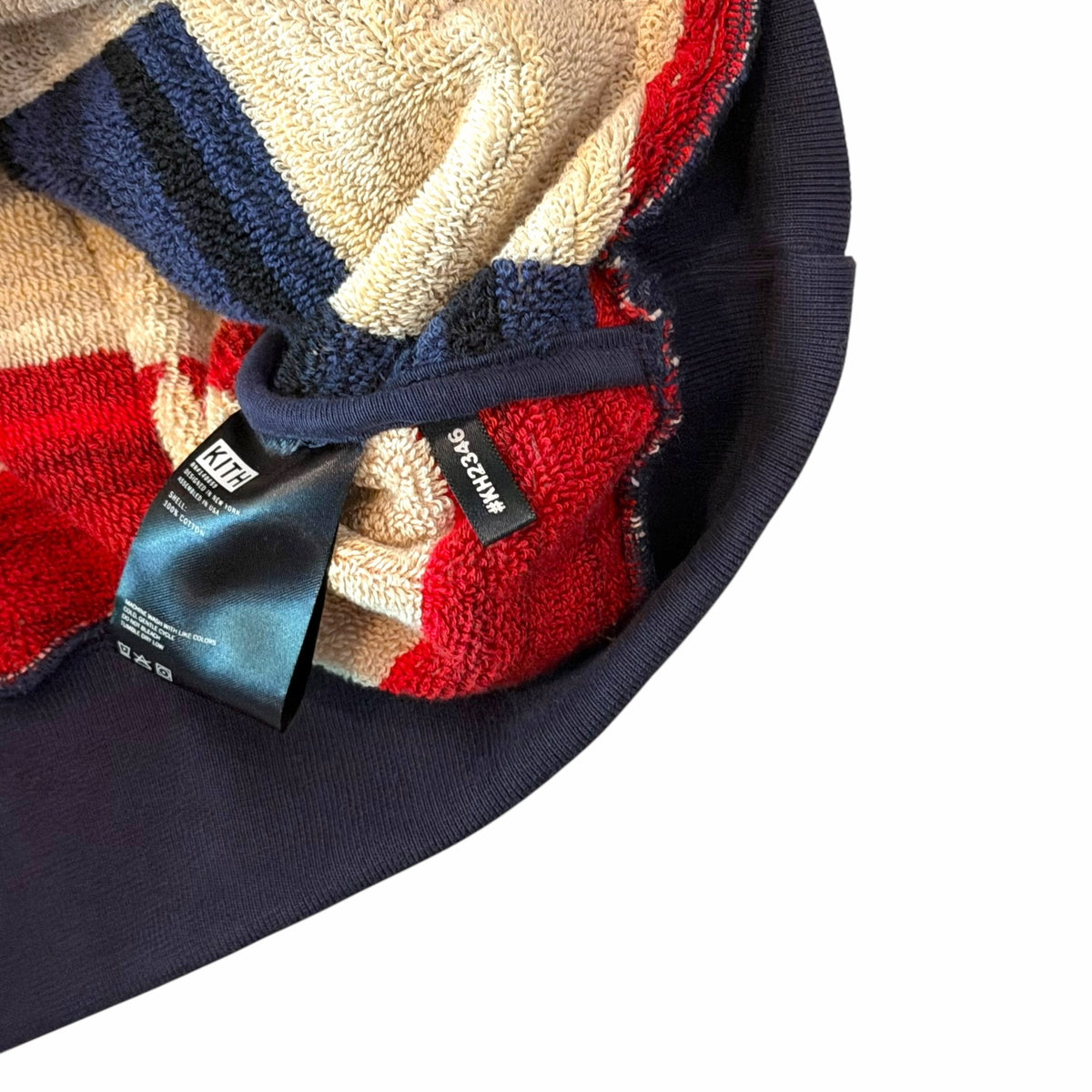 Vangsworld, Inc KITH and PENDLETON hoodie interior label showing 100% cotton material and geometric pattern detail