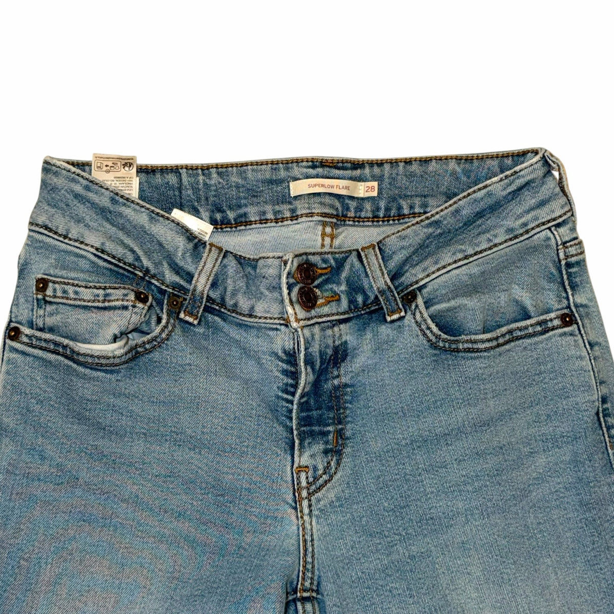 Vangsworld, Inc Levi's Superlow flare light-wash denim jeans featuring a low-rise waist and double button closure.