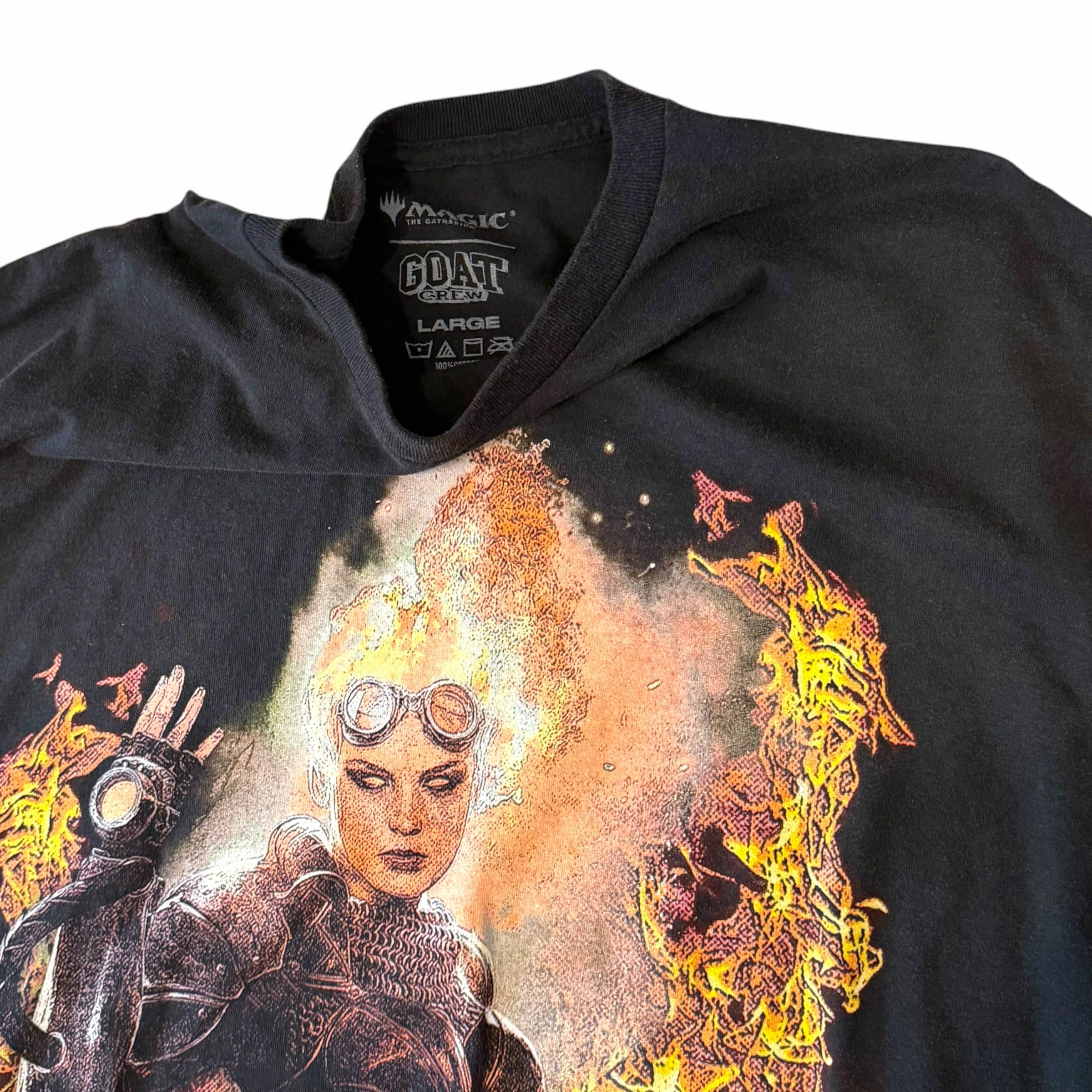 Vangsworld, Inc black cotton Magic The Gathering t-shirt featuring a fiery pyromancer graphic print on the front