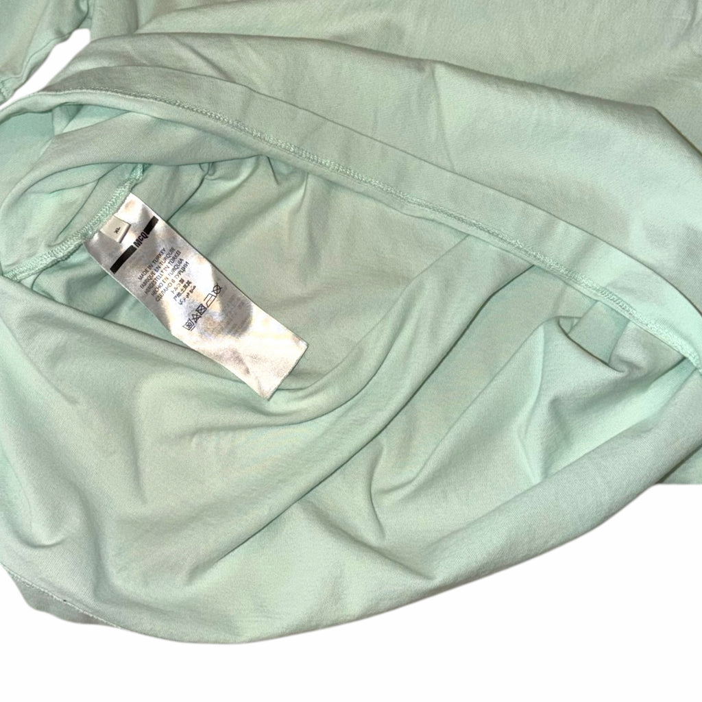 Vangsworld, Inc McQ mint green cotton t-shirt interior label showing care instructions and origin