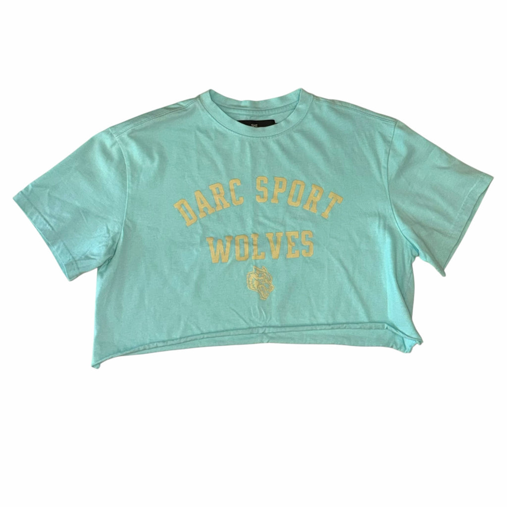 Vangsworld, Inc mint green Darc Sport Wolves graphic crop top with a crew neckline and raw-edge hem.