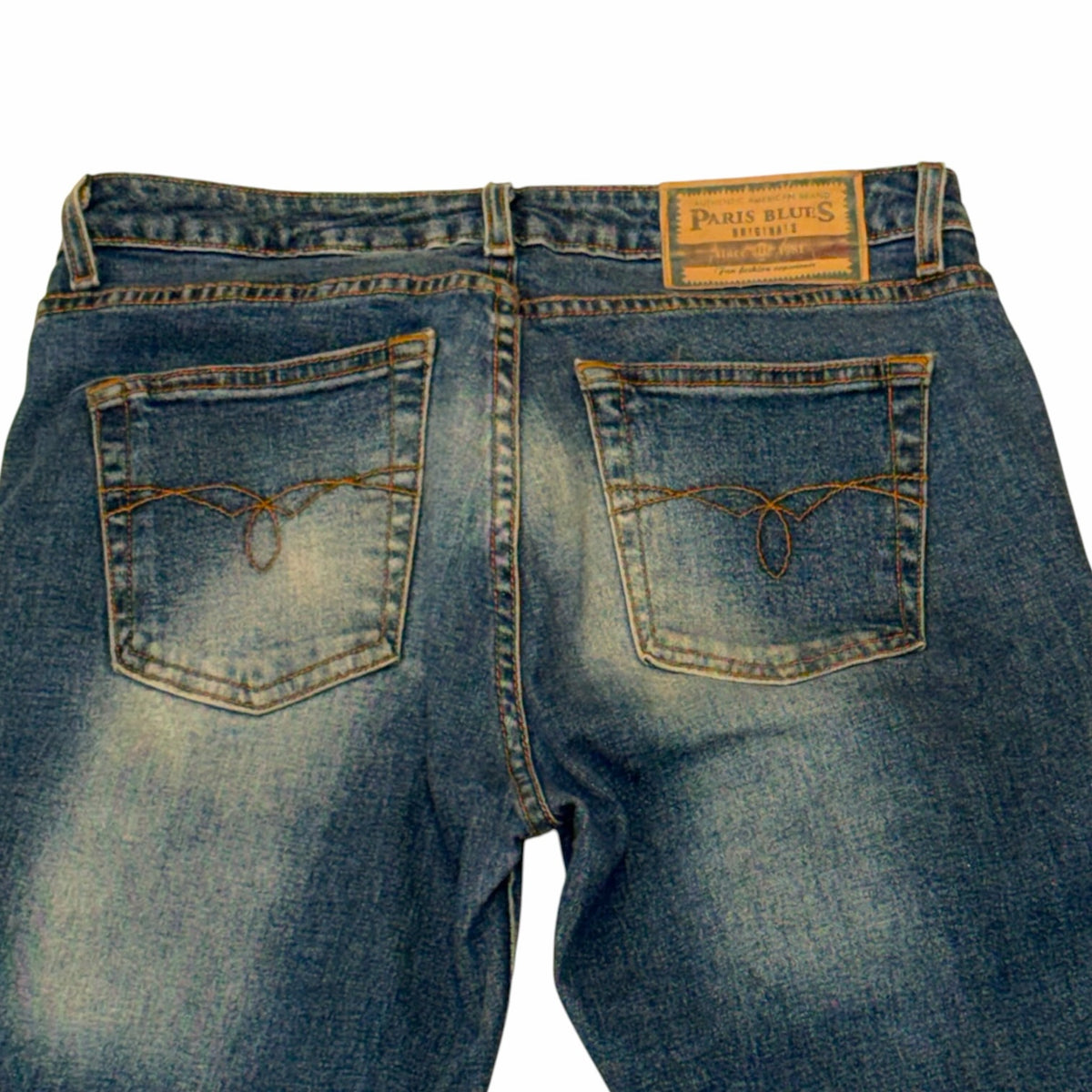 Vangsworld, Inc PARIS BLUES medium-wash denim bootcut jeans with back pocket stitching and leather-look brand patch