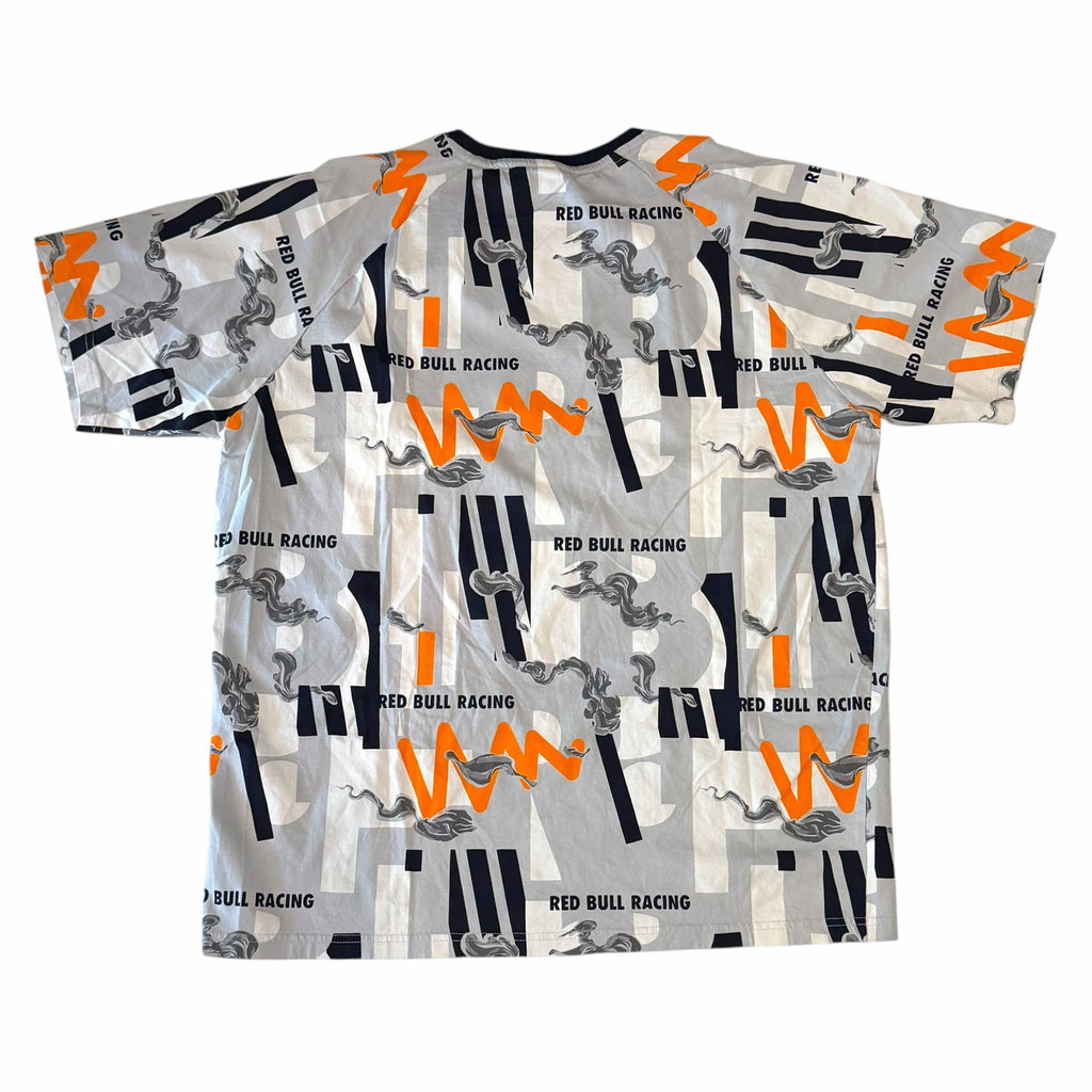 Vangsworld, Inc PUMA Red Bull Racing t-shirt with grey, white, orange, and navy abstract graphic print, back view.