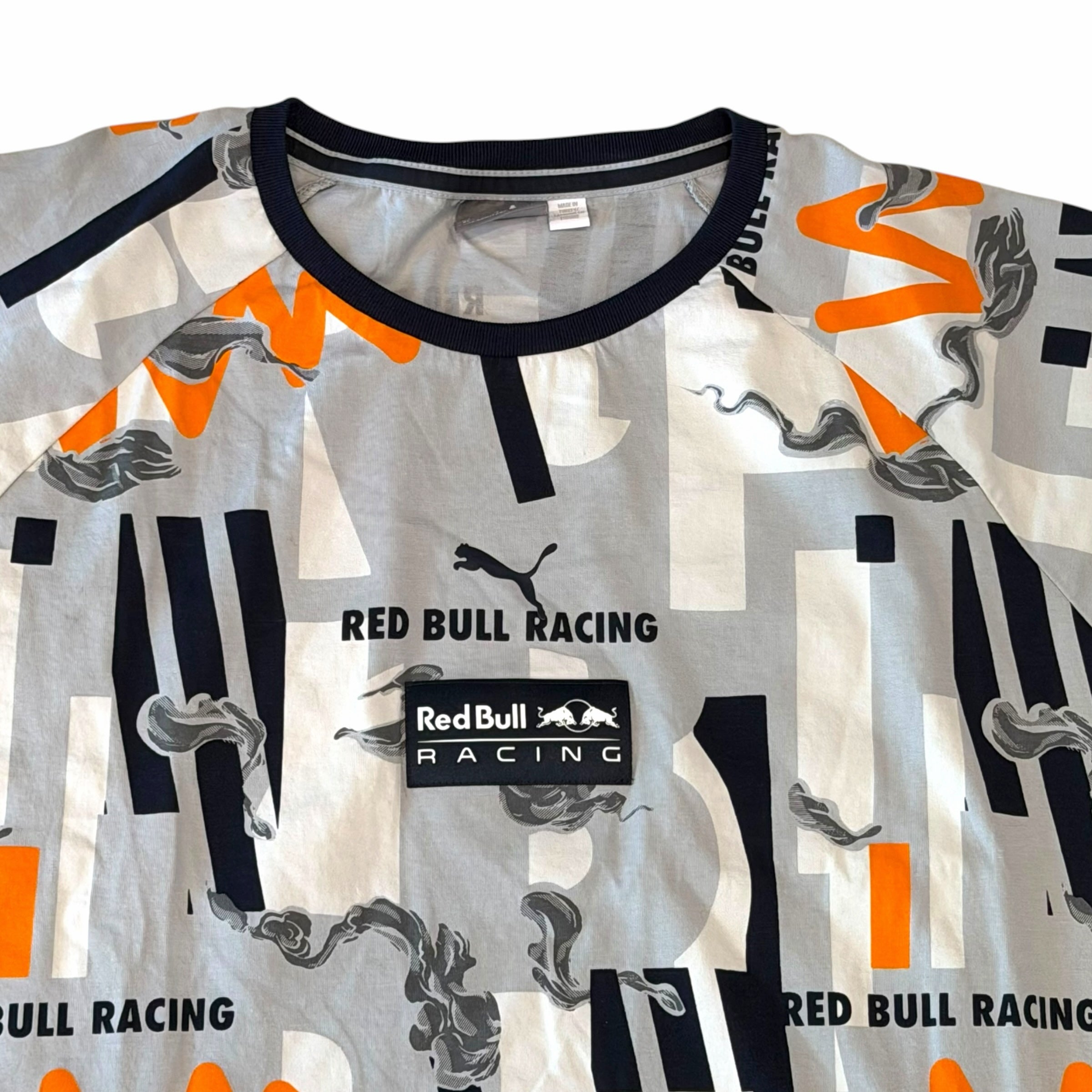 Vangsworld, Inc PUMA Red Bull Racing graphic t-shirt in grey, white, and orange with crew neck and motorsport branding