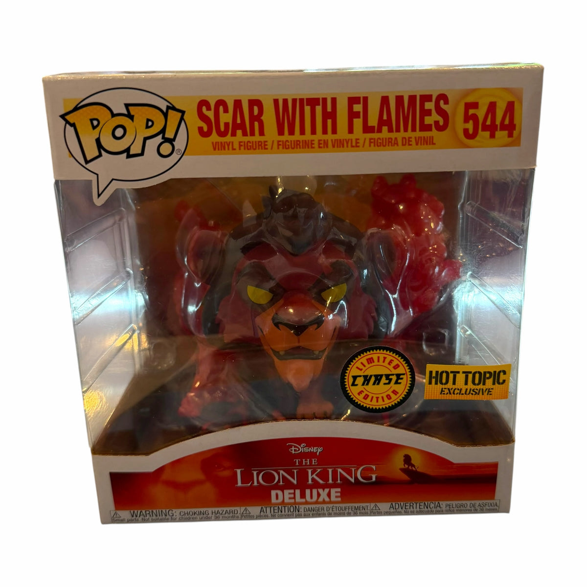 Vangsworld, Inc Funko Pop Deluxe Scar figure from The Lion King in a window box with translucent red flames