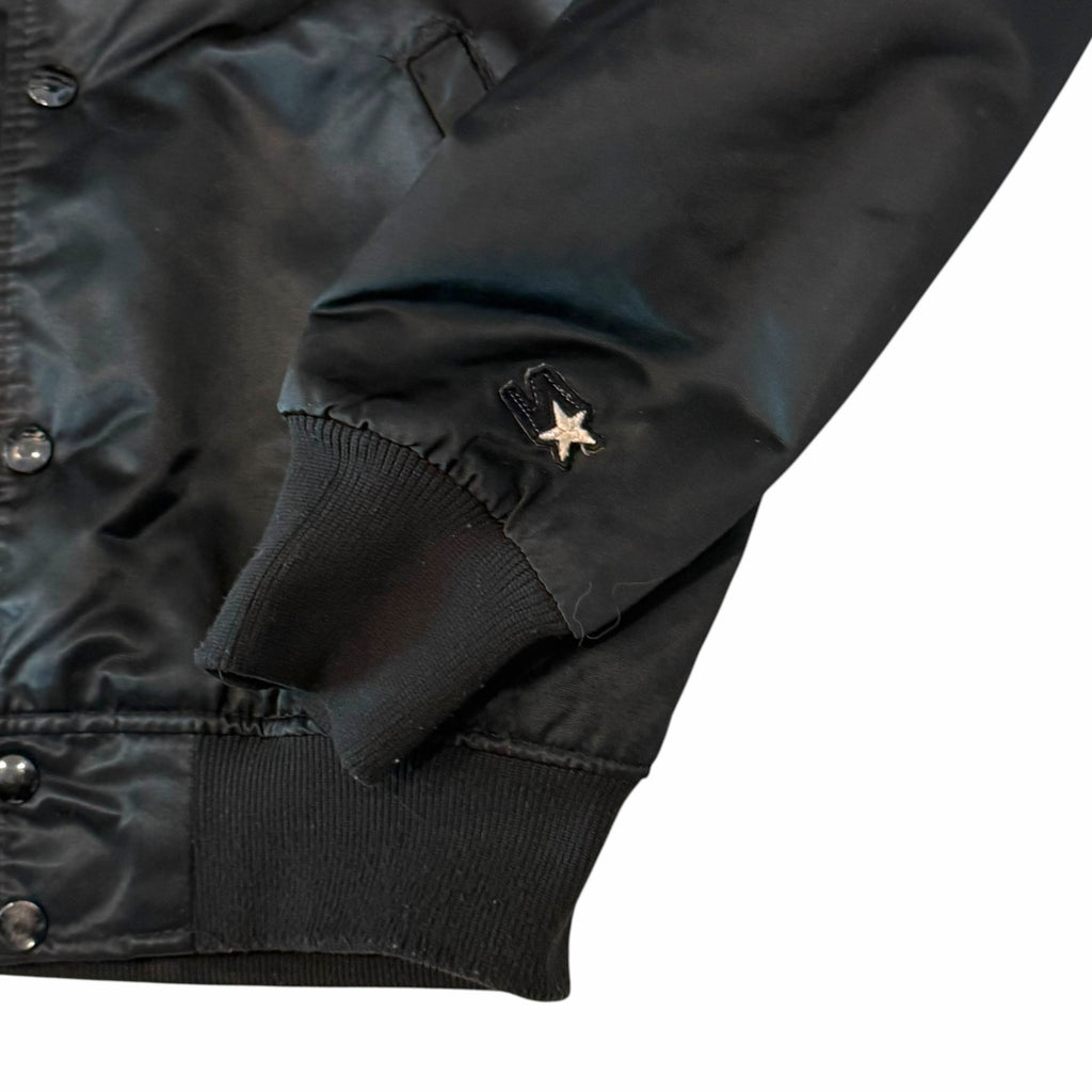 Vangsworld, Inc black satin Starter football jacket sleeve with embroidered logo and ribbed cuff detail