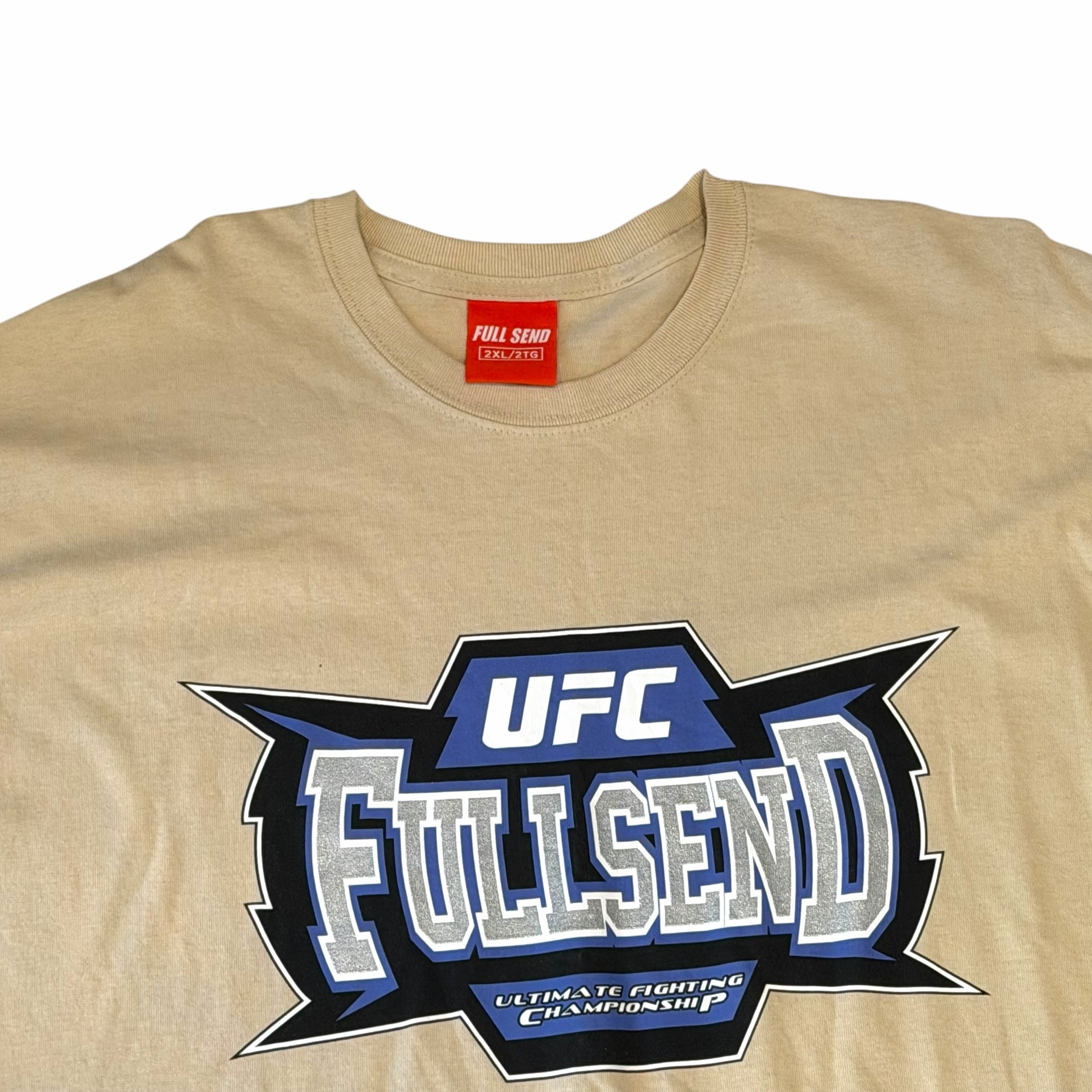 Vangsworld, Inc tan cotton crewneck t-shirt featuring a bold blue, black, and silver Full Send x UFC graphic print.