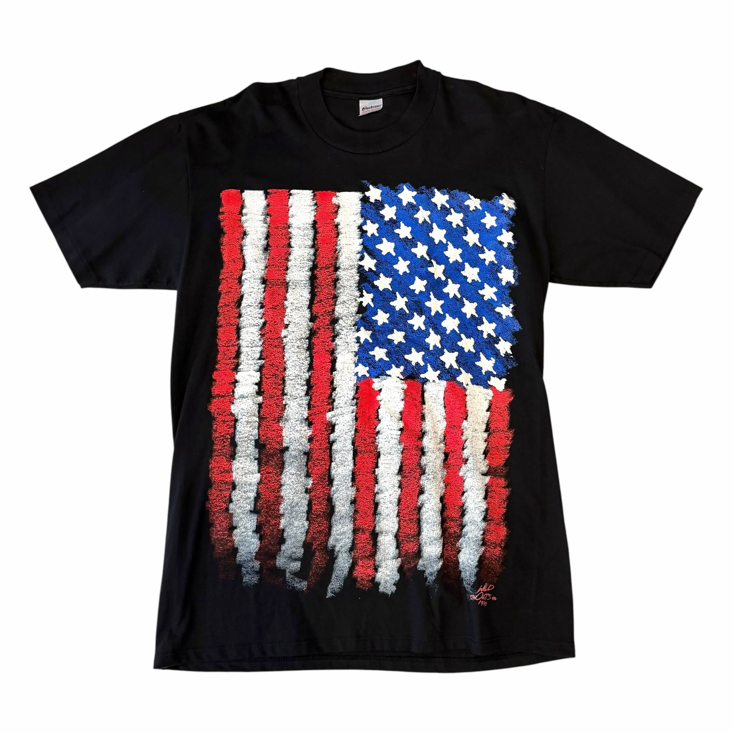 Vangsworld, Inc black cotton crewneck t-shirt with a distressed, brushstroke-style American flag graphic print.