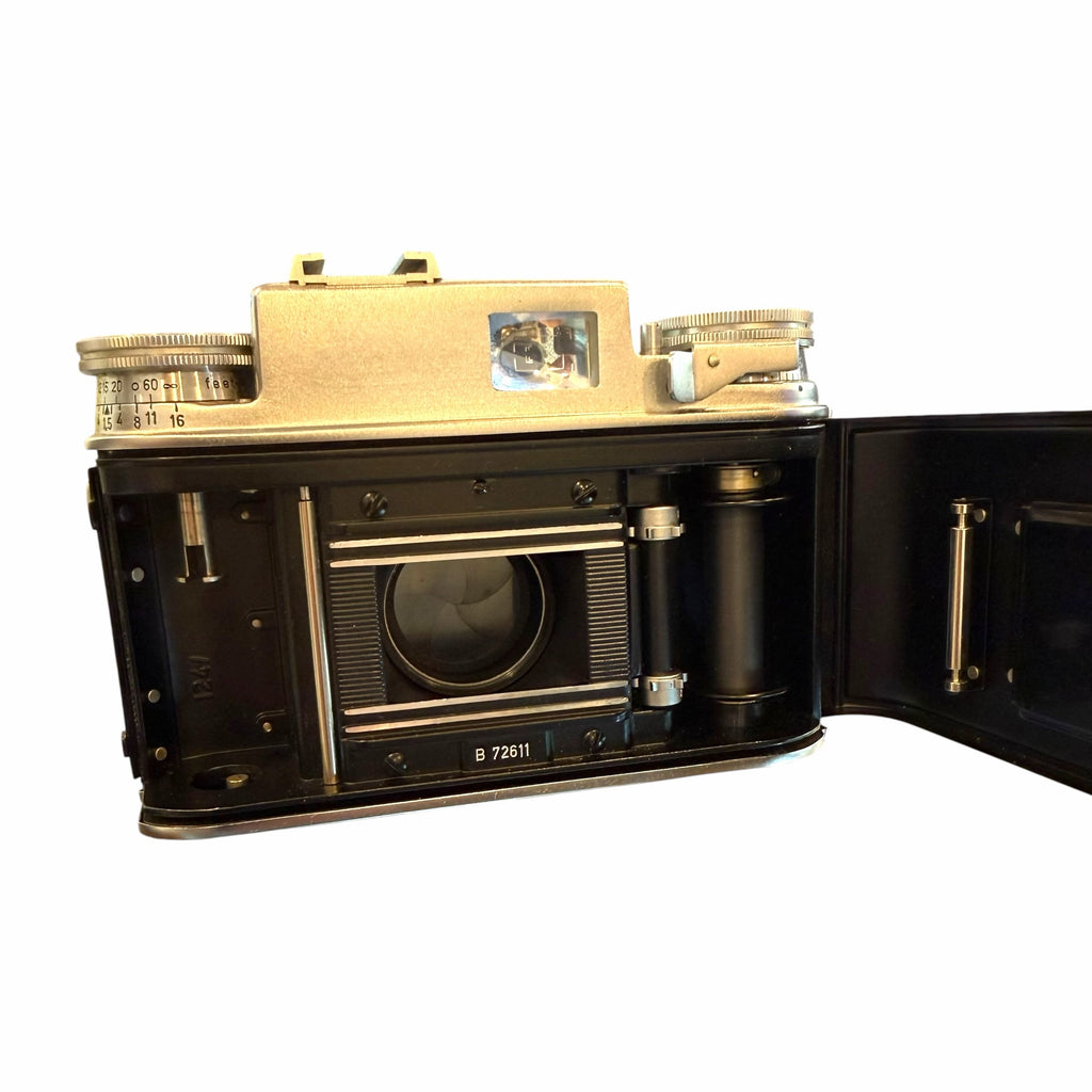Vangsworld, Inc vintage Voigtländer rangefinder film camera with back open showing internal shutter mechanism